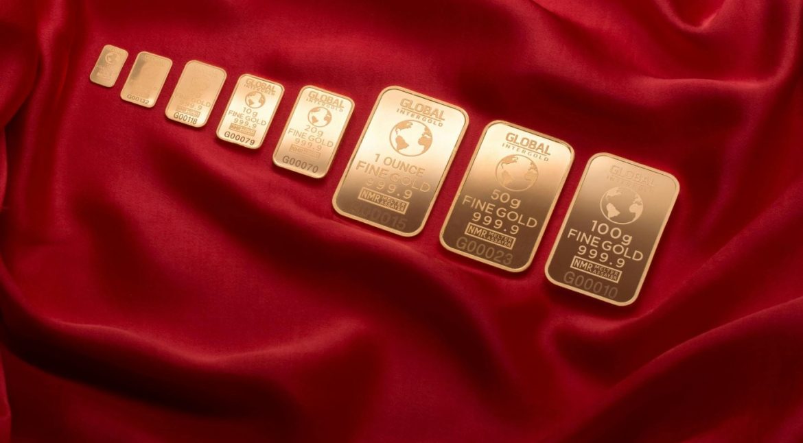 eight pieces of gold on a red cloth to depict gold investment in ghana