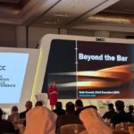 Business leaders discussing gold market insights at DGC 2025